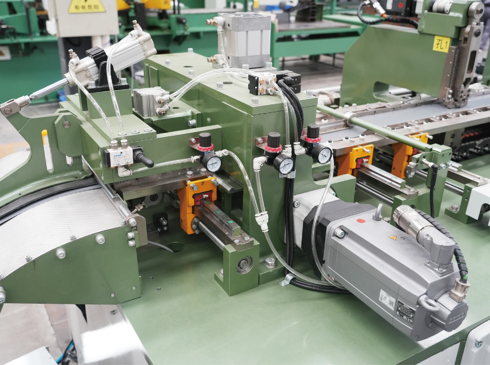 Servo-driven punching station
