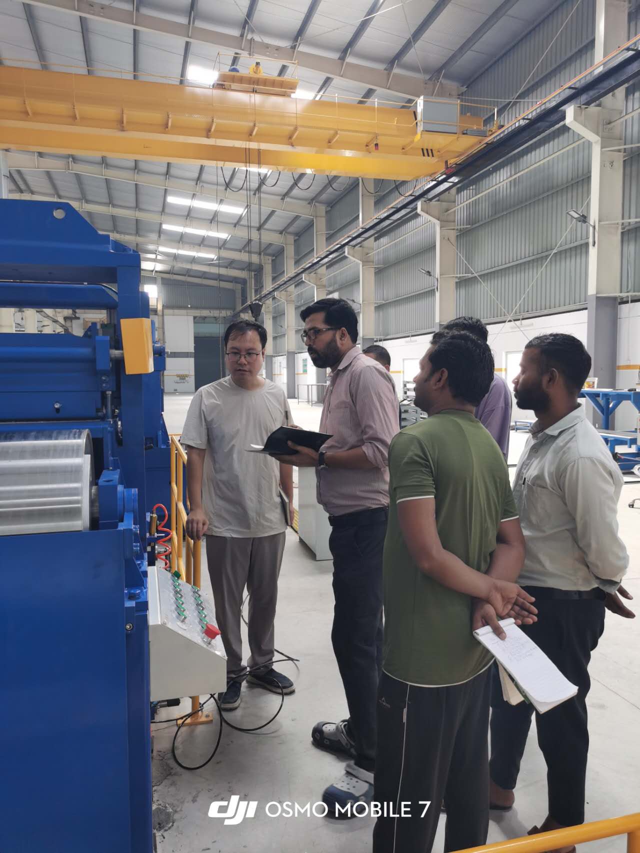 SREE team and customer personnel beside the slitting line during operator training on 30 September 2026
