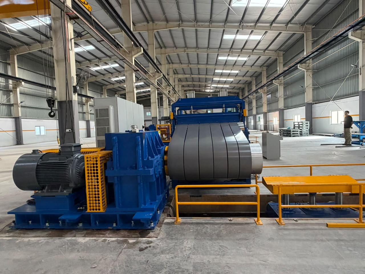 Slit silicon steel strips wound on the recoiler at the Antelp plant in India